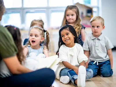 Kids sitting on the floor for storytime