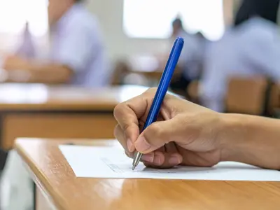 Hand writing on a piece of paper